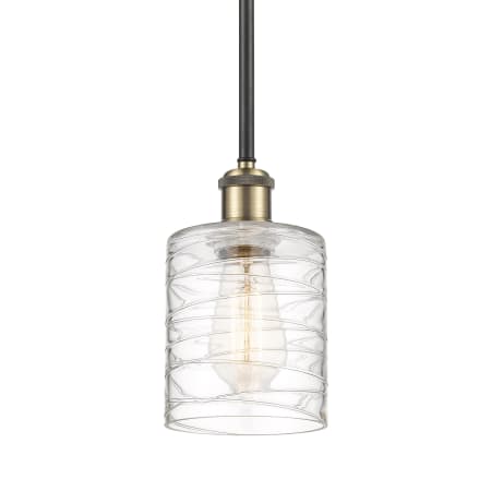 A large image of the Innovations Lighting 516-1S-8-5 Cobbleskill Pendant Deco Swirl / Black Antique Brass