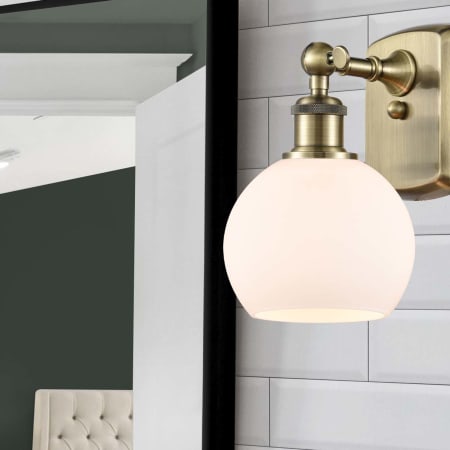 A large image of the Innovations Lighting 516-1W-10-6 Athens Sconce Alternate Image