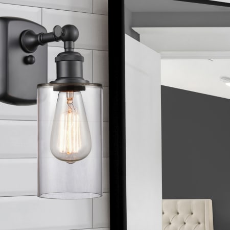A large image of the Innovations Lighting 516-1W-12-4 Clymer Sconce Alternate Image