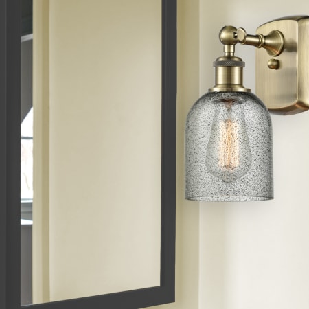 A large image of the Innovations Lighting 516-1W-12-5 Caledonia Sconce Alternate Image