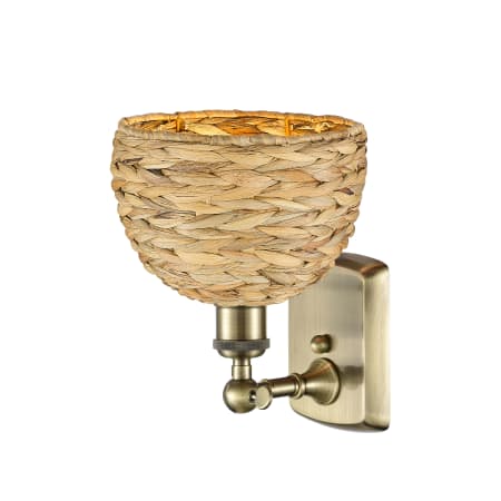 A large image of the Innovations Lighting 516-1W-12-8 Woven Rattan Sconce Alternate image