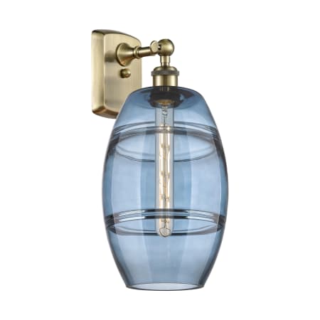 A large image of the Innovations Lighting 516-1W-11-8 Vaz Sconce Antique Brass / Princess Blue