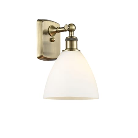 A large image of the Innovations Lighting 516-1W-12-8 Bristol Sconce Antique Brass / Matte White