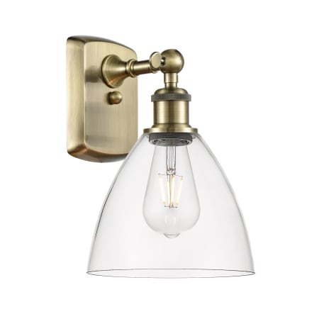 A large image of the Innovations Lighting 516-1W-11-8 Bristol Sconce Antique Brass / Clear