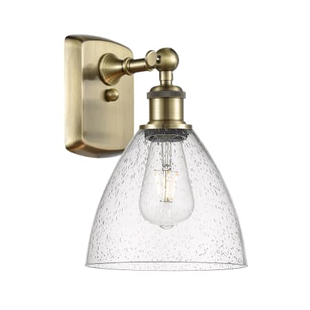 A large image of the Innovations Lighting 516-1W-12-8 Bristol Sconce Antique Brass / Seedy