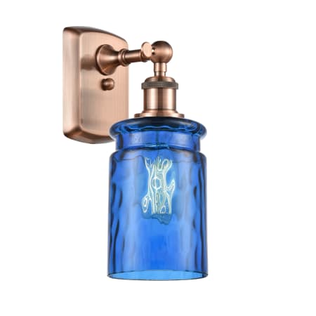 A large image of the Innovations Lighting 516-1W Candor Antique Copper / Princess Blue Waterglass