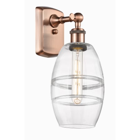 A large image of the Innovations Lighting 516-1W-10-6 Vaz Sconce Antique Copper / Clear