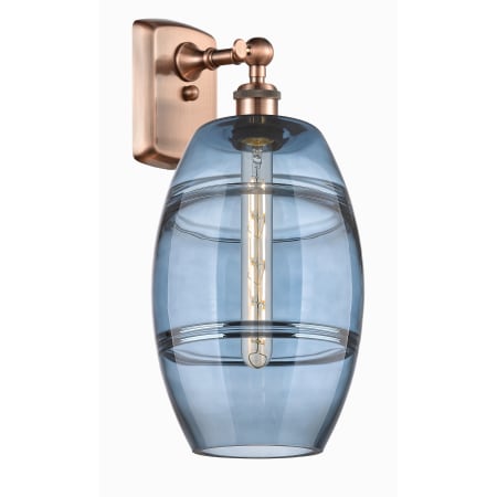 A large image of the Innovations Lighting 516-1W-11-8 Vaz Sconce Antique Copper / Princess Blue