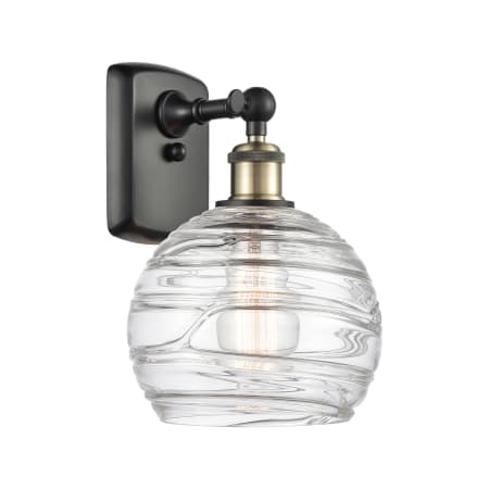 A large image of the Innovations Lighting 516-1W Deco Swirl Black Antique Brass / Clear