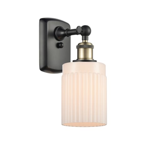 A large image of the Innovations Lighting 516-1W Hadley Black Antique Brass / Matte White
