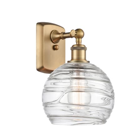 A large image of the Innovations Lighting 516-1W Deco Swirl Brushed Brass / Clear
