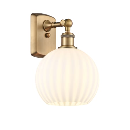 A large image of the Innovations Lighting 516-1W-11-8 White Venetian Sconce Brushed Brass / White Venetian