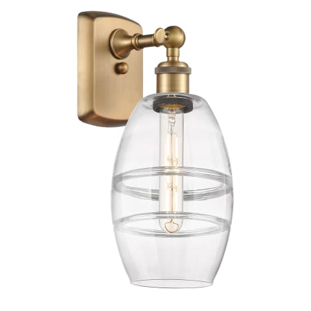 A large image of the Innovations Lighting 516-1W-10-6 Vaz Sconce Brushed Brass / Clear