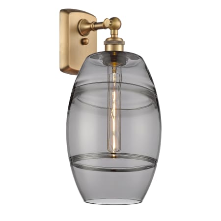 A large image of the Innovations Lighting 516-1W-11-8 Vaz Sconce Brushed Brass / Light Smoke