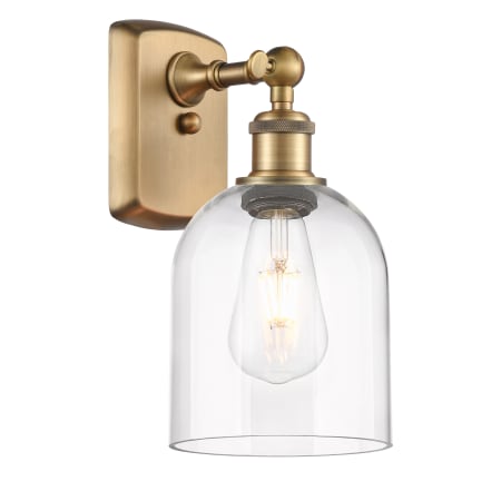 A large image of the Innovations Lighting 516-1W-11-6 Bella Sconce Brushed Brass / Clear