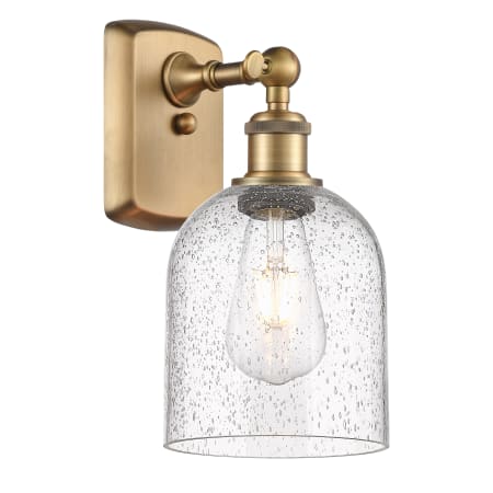 A large image of the Innovations Lighting 516-1W-11-6 Bella Sconce Brushed Brass / Seedy