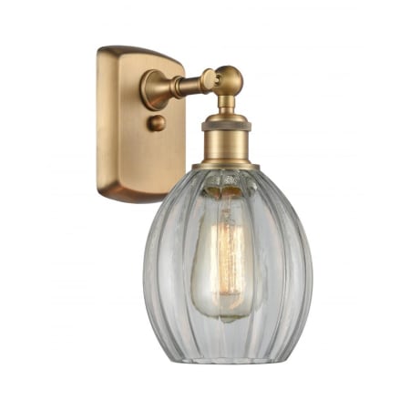 A large image of the Innovations Lighting 516-1W Eaton Brushed Brass / Clear