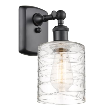 A large image of the Innovations Lighting 516-1W-9-5 Cobbleskill Sconce Matte Black / Deco Swirl