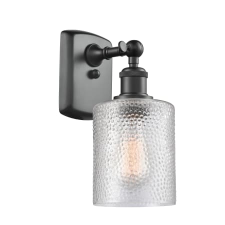 A large image of the Innovations Lighting 516-1W Cobbleskill Matte Black / Clear
