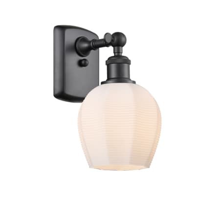 A large image of the Innovations Lighting 516-1W-10-6 Norfolk Sconce Matte Black / Matte White