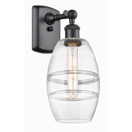 A large image of the Innovations Lighting 516-1W-10-6 Vaz Sconce Matte Black / Clear