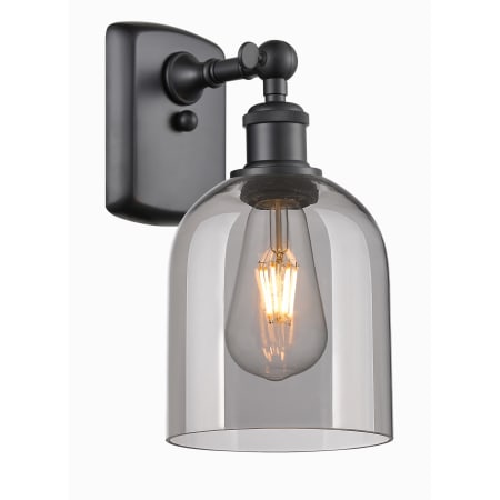 A large image of the Innovations Lighting 516-1W-11-6 Bella Sconce Matte Black / Light Smoke