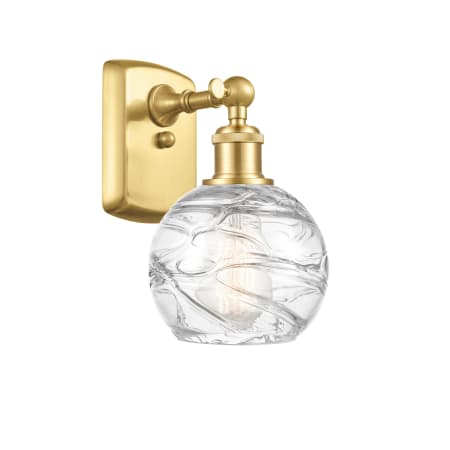 A large image of the Innovations Lighting 516-1W-11-6 Athens Sconce Satin Gold / Clear Deco Swirl