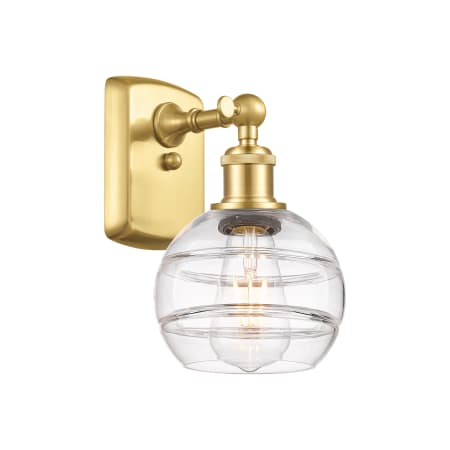 A large image of the Innovations Lighting 516-1W-9-6 Rochester Sconce Satin Gold / Clear