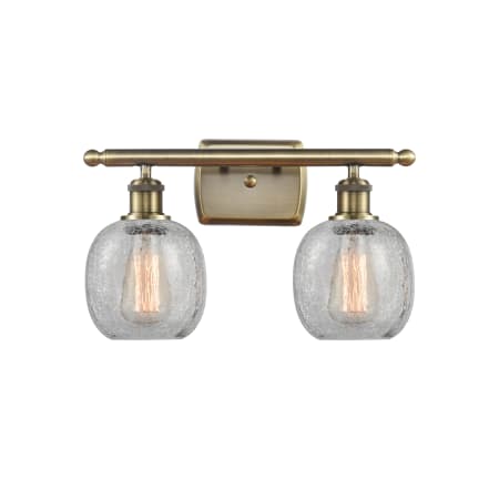 A large image of the Innovations Lighting 516-2W-11-16 Belfast Vanity Clear Crackle / Antique Brass