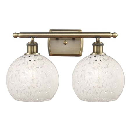 A large image of the Innovations Lighting 516-2W-9-16 White Mouchette Vanity Antique Brass / White Mouchette