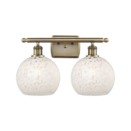 A large image of the Innovations Lighting 516-2W-11-18 White Mouchette Vanity Antique Brass / White Mouchette