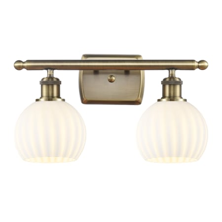 A large image of the Innovations Lighting 516-2W-9-16 White Venetian Vanity Antique Brass / White Venetian