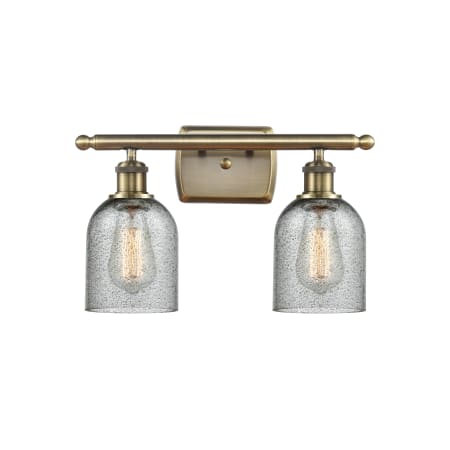 A large image of the Innovations Lighting 516-2W-12-16 Caledonia Vanity Charcoal / Antique Brass