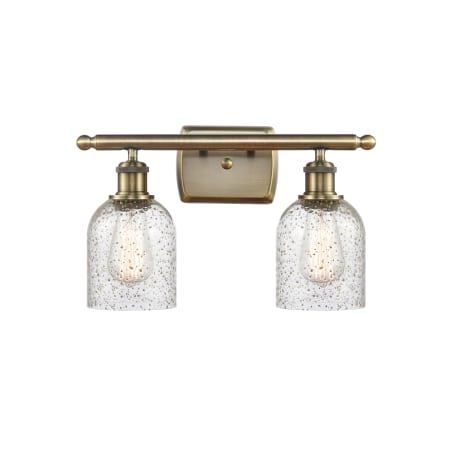 A large image of the Innovations Lighting 516-2W-12-16 Caledonia Vanity Mica / Antique Brass