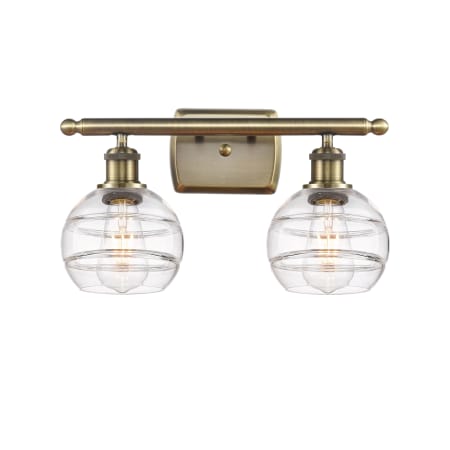 A large image of the Innovations Lighting 516-2W-9-16 Rochester Vanity Antique Brass / Clear