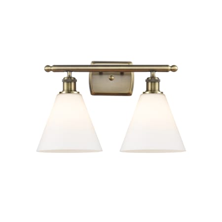 A large image of the Innovations Lighting 516-2W-12-18 Berkshire Vanity Antique Brass / Matte White