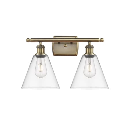 A large image of the Innovations Lighting 516-2W-11-18 Berkshire Vanity Antique Brass / Clear