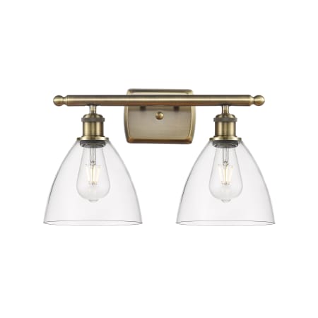 A large image of the Innovations Lighting 516-2W-11-18 Bristol Vanity Antique Brass / Clear