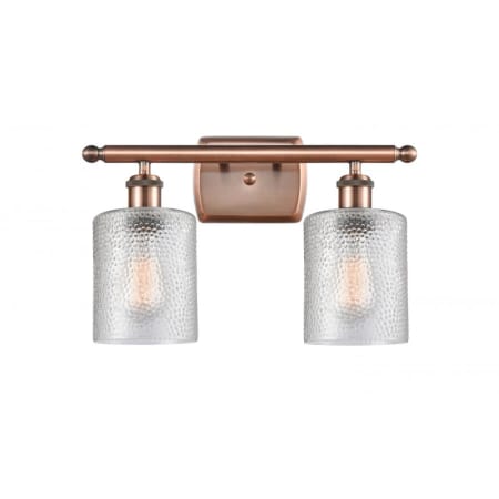A large image of the Innovations Lighting 516-2W Cobbleskill Antique Copper / Clear