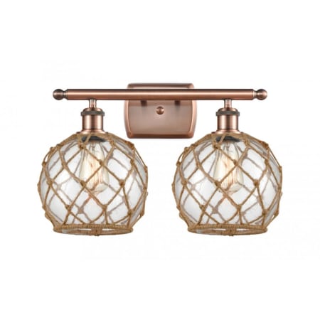 A large image of the Innovations Lighting 516-2W Farmhouse Rope Antique Copper / Clear / Brown