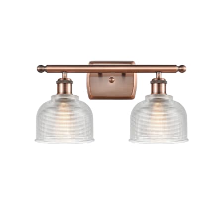 A large image of the Innovations Lighting 516-2W Dayton Antique Copper / Clear