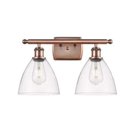 A large image of the Innovations Lighting 516-2W-11-18 Bristol Vanity Antique Copper / Clear