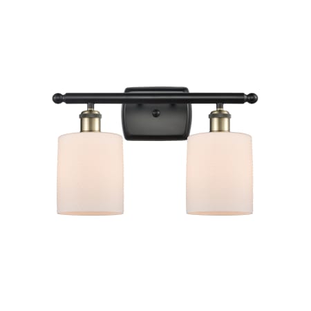 A large image of the Innovations Lighting 516-2W Cobbleskill Black Antique Brass / Matte White
