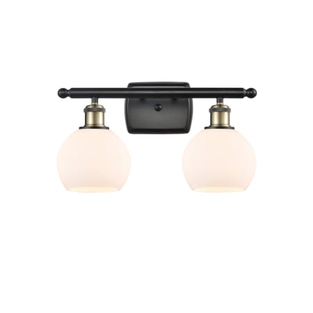 A large image of the Innovations Lighting 516-2W-10-16 Athens Vanity Black Antique Brass / Matte White