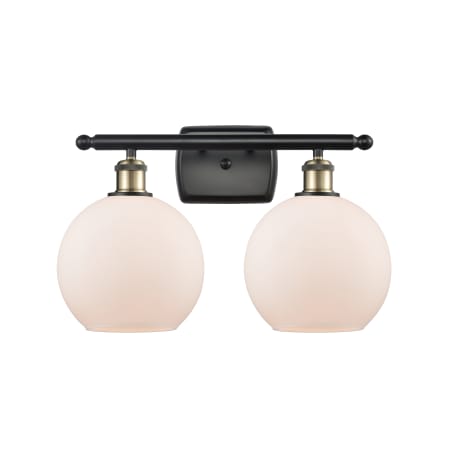 A large image of the Innovations Lighting 516-2W-12-18 Athens Vanity Black Antique Brass / Matte White