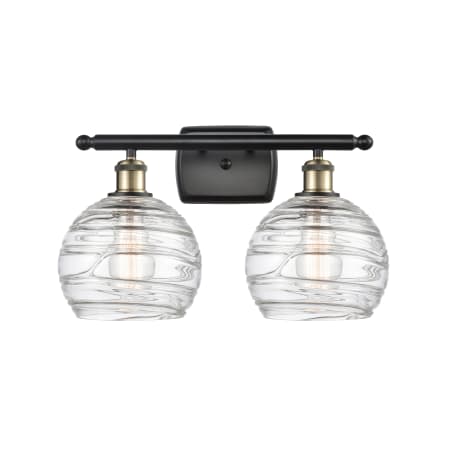 A large image of the Innovations Lighting 516-2W Deco Swirl Black Antique Brass / Clear