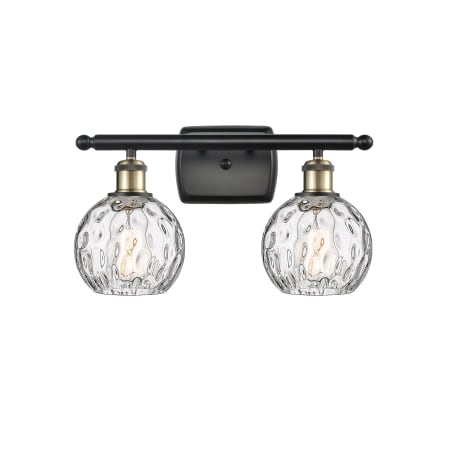 A large image of the Innovations Lighting 516-2W-11-16 Athens Vanity Black Antique Brass / Clear Water Glass