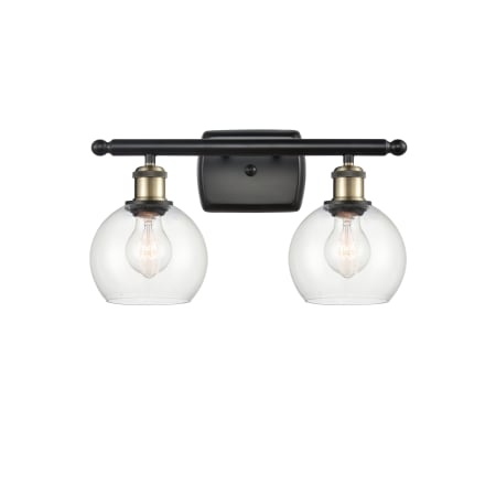 A large image of the Innovations Lighting 516-2W-9-16 Athens Vanity Black Antique Brass / Clear