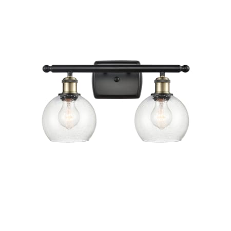 A large image of the Innovations Lighting 516-2W-10-16 Athens Vanity Black Antique Brass / Seedy