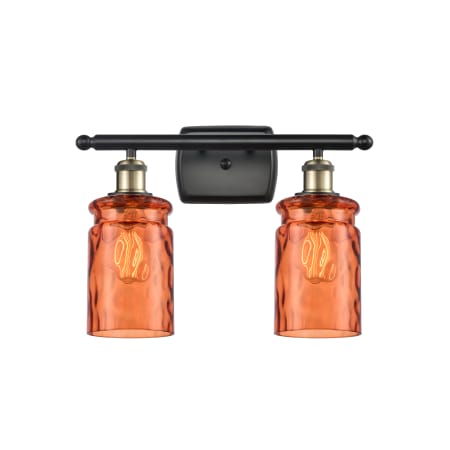 A large image of the Innovations Lighting 516-2W Candor Black Antique Brass / Turmeric Waterglass